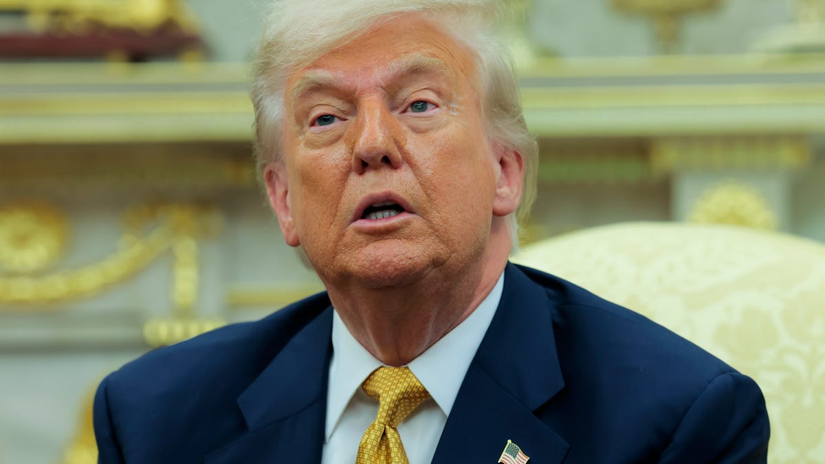 President Donald Trump speaks to reporters during a meeting with Crown Prince of Bahrain Salman bin Hamad Al Khalifa in the Oval Office of the White House on July 16, 2025, in Washington, D.C.