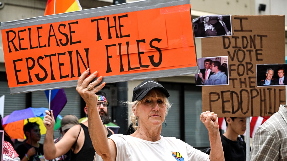 A protester holds a sign calling for the release of files regarding late sex offender Jeffrey Epstein, as part of the 'Good Trouble Lives On' national day of action against the administration of US President Donald Trump in Houston, Texas, on July 17, 2025.