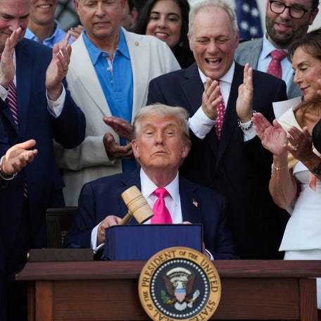 House Republicans applaud President Donald Trump after he signed the One Big Beautiful Bill Act at the White House on July 4, 2025.