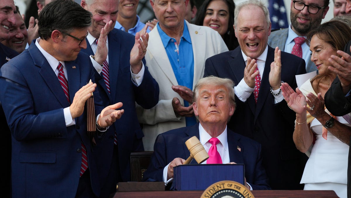 House Republicans applaud President Donald Trump after he signed the One Big Beautiful Bill Act at the White House on July 4, 2025.