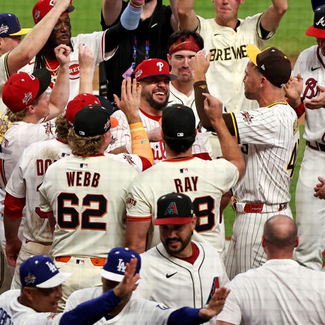 NL players celebrate during the All-Star Game win.