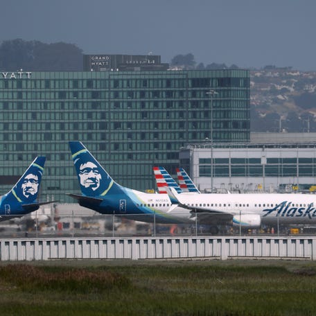 An Alaska Airlines jet taxis at San Francisco International Airport on June 04, 2025 in San Francisco, California.