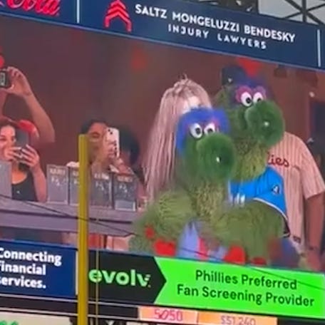 Sports fans across stadiums are recreating the viral CEO kiss cam moment from a Coldplay concert, including the Philadelphia Phillies mascots.