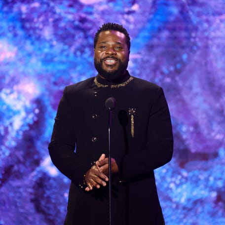 Malcolm-Jamal Warner speaks onstage during the 65th GRAMMY Awards Premiere Ceremony at Microsoft Theater on Feb. 5, 2023, in Los Angeles.
