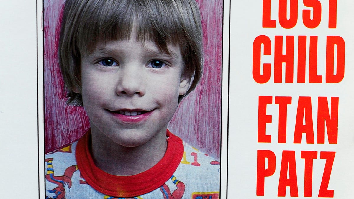 A copy photo of the original missing poster of Etan Patz is shown during a news conference near a New York City apartment building, where police and FBI agents searched a basement for clues in the boy's 1979 disappearance in New York, April 19, 2012.