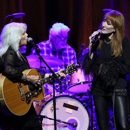 Emmylou Harris (left) and Patti Scialfa perform July 22 during the Trisha Yearwood and Friends salute to Linda Ronstadt at the Country Music Hall of Fame and Museum in Nashville.