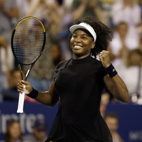 Venus Williams celebrates after match point against Peyton Stearns.