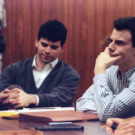 Erik Menendez, right, is pictured with brother Lyle during court proceedings on May 17, 1991.