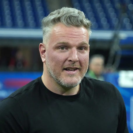Pat McAfee watches during workouts at the 2025 NFL Scouting Combine at Lucas Oil Stadium.