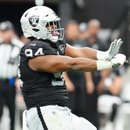 Sep 22, 2024; Paradise, Nevada, USA; Las Vegas Raiders defensive tackle Christian Wilkins (94) celebrates after getting a sack against the Carolina Panthers during the second quarter at Allegiant Stadium.