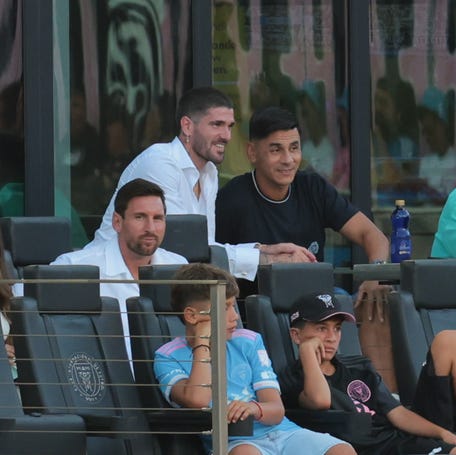 Inter Miami CF forward Lionel Messi (10), midfielder Rodrigo De Paul (7), goalkeeper Oscar Ustari (19) and defender Jordi Alba (18) watch the game against FC Cincinnati at Chase Stadium.