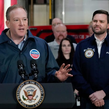 EPA Administrator Lee Zeldin addresses the media as Vice President JD Vance listens at Fire Station 2 in East Palestine, Ohio on Feb. 3, 2025. Vice President Vance came to East Palestine to mark the second anniversary of the Norfolk Southern Train derailment.