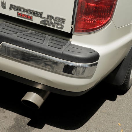 The exhaust of a car is pictured in New York in 2018. REUTERS/Lucas Jackson