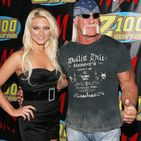 Brooke Hogan and her father Hulk Hogan pose in the press room at Z100's Jingle Ball 2006 at Madison Square Garden on Dec. 15, 2006, in New York City.