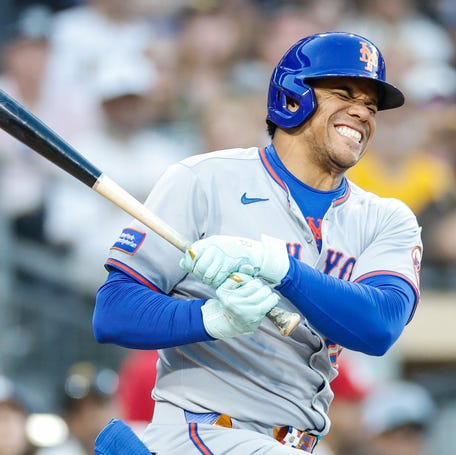 New York Mets right fielder Juan Soto reacts after fouling off a ball off his lower extremity during the fourth inning against the New York Mets at Petco Park on July 29, 2025.