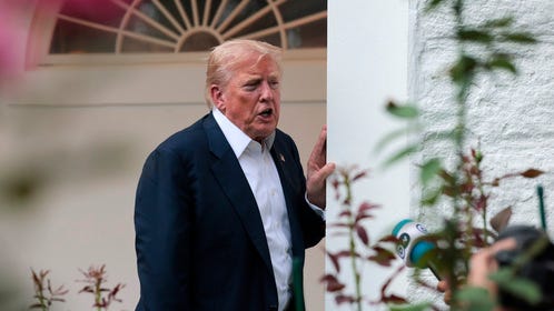 President Donald Trump speaks to reporters near the Rose Garden after returning to the White House on Marine One on July 29, 2025 in Washington, DC.