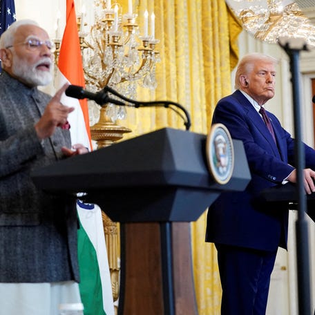 U.S. President Donald Trump listens as Indian Prime Minister Narendra Modi speaks during a joint press conference at the White House in Washington, D.C., U.S., February 13, 2025.