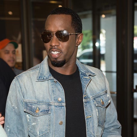 Sean "Diddy" Combs arrives at Macy's to premiere his new fragrance Sean John at Macy's Lenox Square on Sept. 8, 2016, in Atlanta.