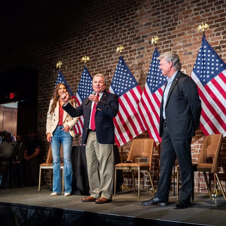 Then-South Dakota Gov. Kristi Noem campaigns with Georgia Republican Reps. Buddy Carter, center, and Mike Collins at a presidential reelection rally for Donald Trump in 2024 in Savannah, Georgia.