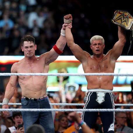 John Cena congratulates Cody Rhodes after Rhodes won and became the WWE Undisputed Champion during the WWE SummerSlam 2025 at MetLife Stadium on Aug. 3, 2025 in East Rutherford, New Jersey.