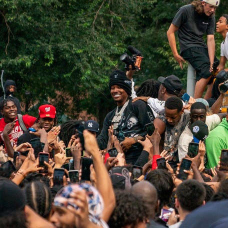 Streamer Duke Dennis dances at a "giveaway" event announced by popular live streamer Kai Cenat that grew chaotic, prompting police officers to respond and disperse the crowd at Union Square and the surrounding streets in New York City on Aug. 4, 2023.
