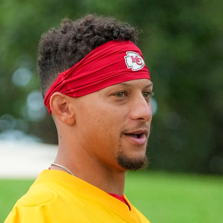 Kansas City Chiefs quarterback Patrick Mahomes (15) walks down the hill to the practice fields during training camp at Missouri Western State University.
