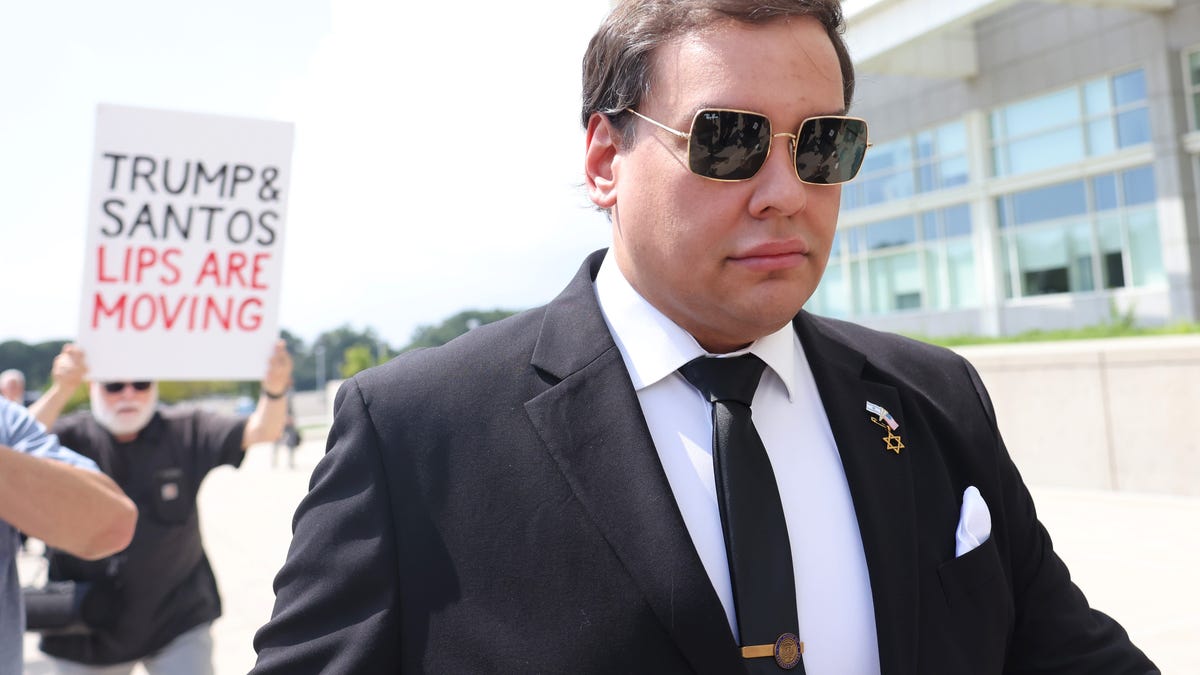 Former U.S. Rep. George Santos arrives for a court hearing at U.S. District Court Eastern District of New York Long Island Courthouse on August 19, 2024 in West Islip, New York.