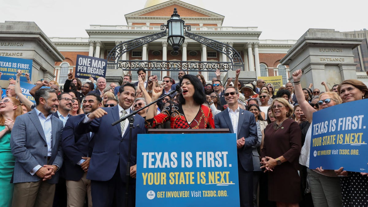 Texas state Sen. Carol Alvarado talks at a press conference at the Massachusetts State House in Boston, Massachusetts, Aug. 6, 2025. Democratic lawmakers from Texas left their state to deny Republicans the quorum needed to redraw congressional districts.