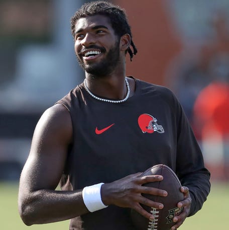 Cleveland Browns quarterback Shedeur Sanders (12) is all smiles during NFL training camp at CrossCountry Mortgage Campus, Wednesday, July 30, 2025, in Berea, Ohio.