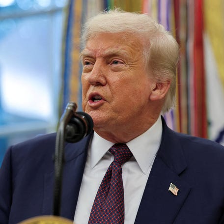 FILE PHOTO: U.S. President Donald Trump speaks in the Oval Office at the White House in Washington, D.C., U.S., August 6, 2025. REUTERS/Jonathan Ernst/File Photo