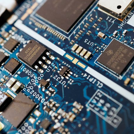 Semiconductor chips are seen on a circuit board of a computer in this illustration picture taken Feb. 25, 2022.