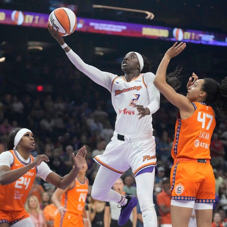 Phoenix Mercury guard Kahleah Copper (2) lays the ball in past Connecticut Sun guard Leila Lacan (47) during the first quarter at PHX Arena on Aug. 5, 2025, in Phoenix.