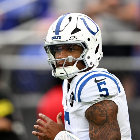 BALTIMORE, MARYLAND - AUGUST 07: Anthony Richardson Sr. #5 of the Indianapolis Colts warms up before the game against the Baltimore Ravens during the NFL Preseason 2025 at M&T Bank Stadium.