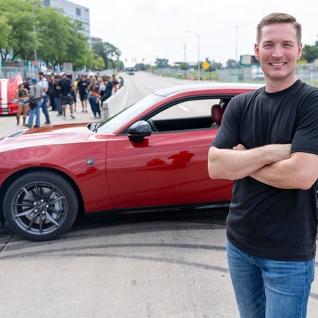 Dodge brand CEO Matt McAlear poses for a portrait ahead of Roadkill Nights, Friday, Aug. 8, 2025, in Pontiac.