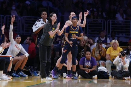Aug 5, 2025; Los Angeles, California, USA; Indiana Fever guard Caitlin Clark (22) reacts from the bench in the second half against the LA Sparks at Crypto.com Arena. Mandatory Credit: Kirby Lee-Imagn Images