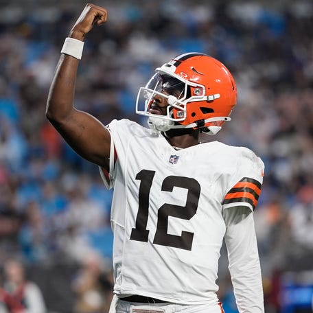 Cleveland Browns quarterback Shedeur Sanders (12) celebrates his touchdown pass against the Carolina Panthers during the second quarter at Bank of America Stadium in Charlotte on Aug. 8, 2025.