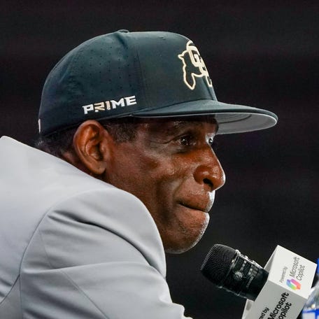 Colorado head coach Deion Sanders speaks during 2025 Big 12 Football Media Days.