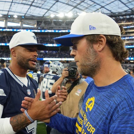 Dallas Cowboys quarterback Dak Prescott (4) shakes hands with Los Angeles Rams quarterback Matthew Stafford after the game at SoFi Stadium on Aug. 9, 2025.