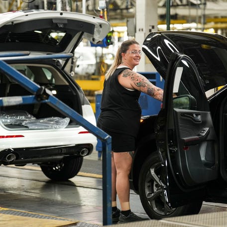 Ford workers at the Louisville Assembly Plant Monday morning, August, 11, 2025 where the giant auto and truck manufacturer announced plans to invest $5 billion and create roughly 4,000 jobs focused on EV production across the Louisville Assembly Plant and the BlueOval Battery Park in Michigan. The company touted the EV investment will create a new production line with a more comfortable work environment.