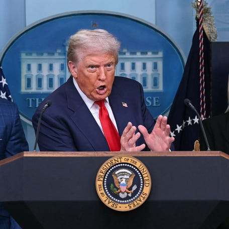 From left, Defense Secretary Pete Hegseth, President Donald Trump and Attorney General Pam Bondi brief reporters on their plans for Washington, DC, on Aug. 11, 2025.