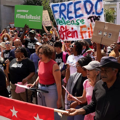 Washington D.C. residents and activists protested President Donald Trump taking federal control over police and National Guard deployment.