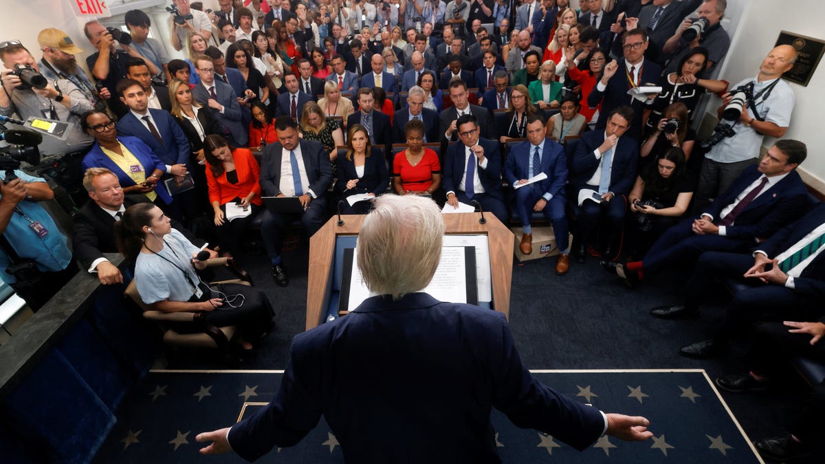 U.S. President Donald Trump gestures as he speaks to the press about deploying federal law enforcement agents in Washington to bolster the local police presence, in the Press Briefing Room at the White House, in Washington D.C., U.S., August 11, 2025.