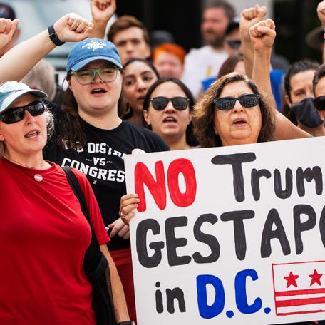 Protesters rally in downtown Washington D.C. near the White House on August 11, 2025, after President Donald Trump ordered an increased federal law enforcement presence across the streets of Washington, D.C., a federal takeover of Metro Police Department and the deployment of National Guard troop in the city.