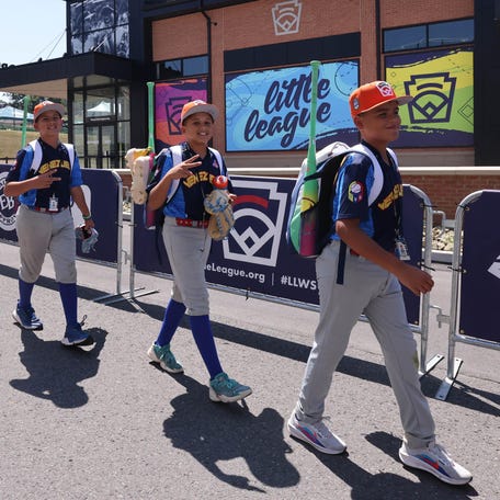 Venezuela coaches and players walk to baseball practice at the Little League World Series Complex in South Williamsport, PA on Monday, Aug. 11, 2025.