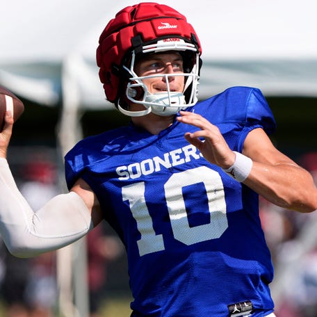 Oklahoma quarterback John Mateer throws a pass during practice in Norman, Okla., Wednesday, Aug., 6, 2025.