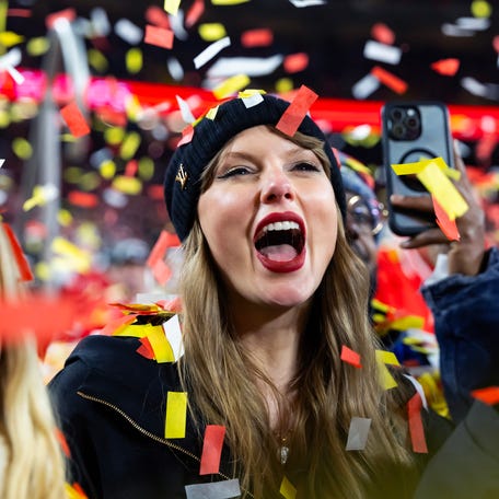 Jan 26, 2025; Kansas City, MO, USA; Recording artist Taylor Swift celebrates after the AFC Championship game against the Buffalo Bills at GEHA Field at Arrowhead Stadium.