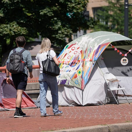 Tents along the sidewalk in Washington, DC, on Aug. 11, 2025, when President Donald Trump announced plans to seize control of Washington's Metropolitan Police Department and sweep homeless people off the city's streets.