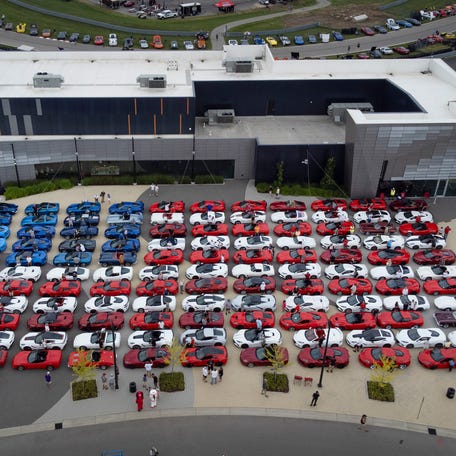 122 red, white and blue Corvettes are parked to form the American flag during the Corvettes on Woodward event at the M1 Concourse in Pontiac on Wednesday, Aug. 13, 2025 to help kick off the 2025 Woodward Dream Cruise.