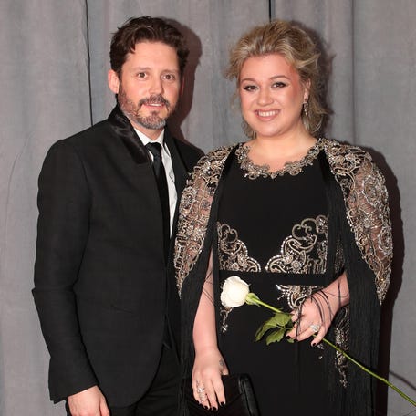 Brandon Blackstock, left, and Kelly Clarkson attend the 60th annual Grammy Awards at Madison Square Garden in New York City on Jan. 28, 2018.
