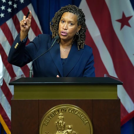 Washington, DC, Mayor Muriel Bowser, joined by police chief Pamela Smith and fire chief John Donnelly, speaks at a news conference on Aug. 11, 2025, after President Donald Trump announced a federal takeover of the Metropolitan Police Department.